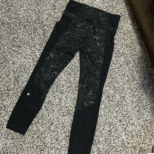 Woman’s black patterned Lululemon yoga leggings. Size 6. Excellent condition.